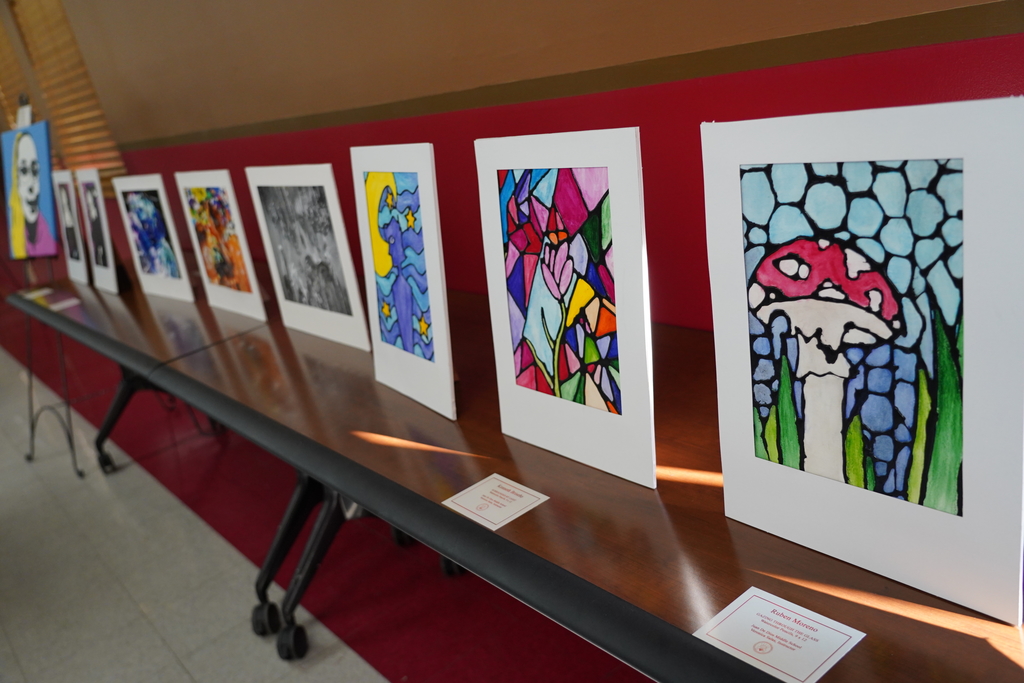 We are thrilled to extend a warm invitation to the entire community for a truly enchanting event - our annual Art Gallery Reception! This year's reception promises to be an extraordinary celebration of creativity, talent, and artistic expression.  Date: May 11th Time: 5:00 PM - 7:00 PM Location: [Venue Name/Address]  Our gallery will be transformed into a captivating space showcasing an incredible collection of artwork from talented students across all grades in our district. From mesmerizing paintings and intricate sculptures to awe-inspiring photographs and imaginative mixed media pieces, this exhibit beautifully reflects the diversity and imagination of our budding artists.