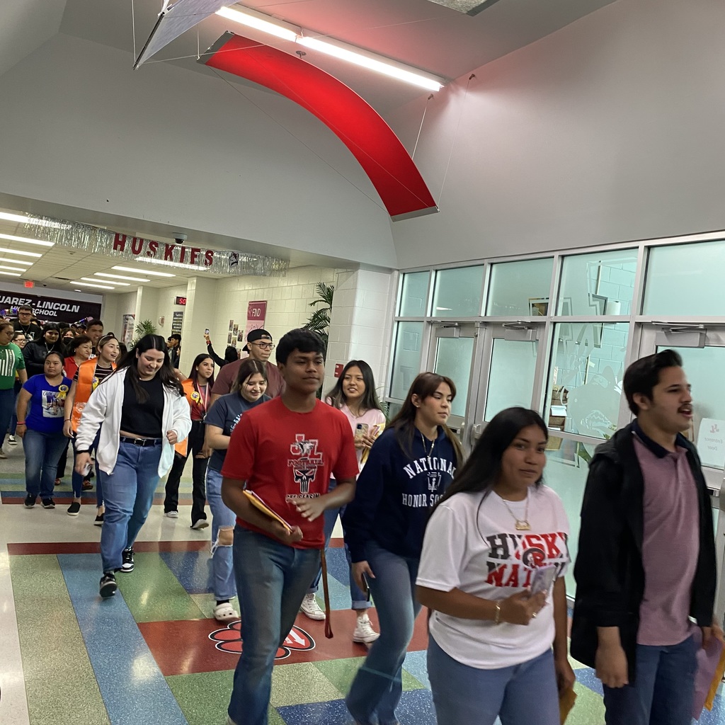 students walking through hallway