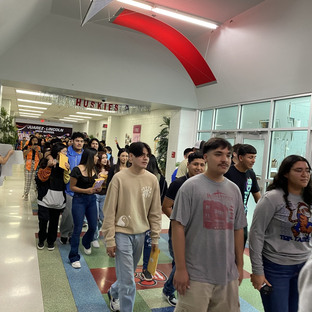 students walking through hallway