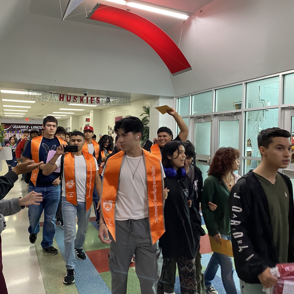 students walking through hallway