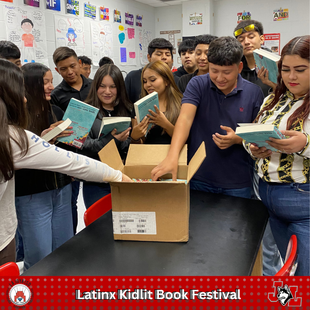 students looking at books as removed from a box